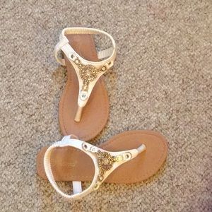 Little girls between toe sandals